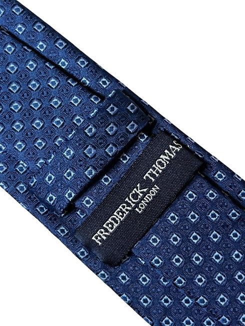 dark blue navy tie with square spotted design